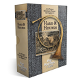 Hare & Hounds board game box by Peg Pastines, featuring a textured gray and black herringbone pattern, tan side panels, vintage-style illustrations, and a brass-colored horn graphic on the front.