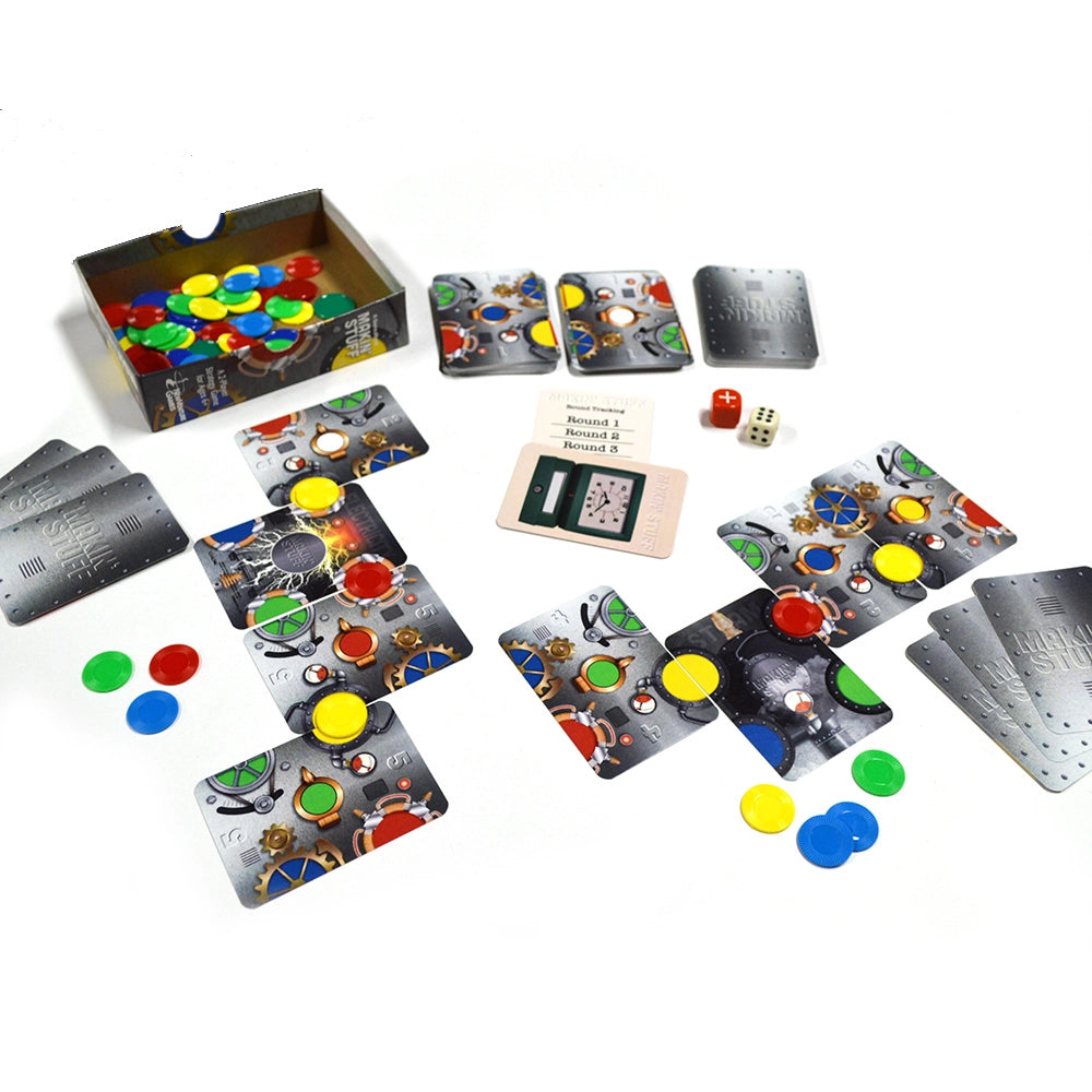 A card game set arranged on a white background, including a deck of playing cards, several small colored tokens in red, yellow and blue, plus two dice and a box.