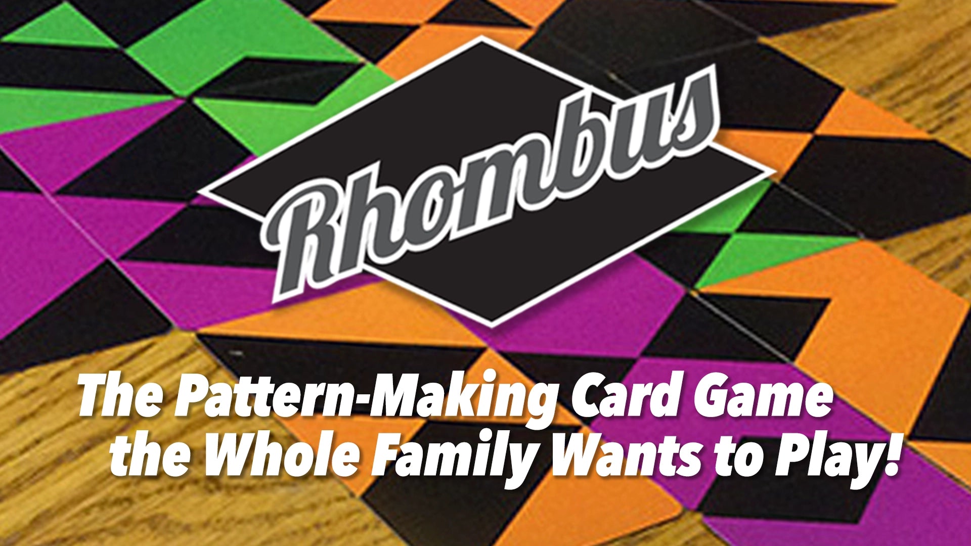 Rhombus pattern-making card game box cover featuring a black rhombus logo with white script over a colorful geometric background of green, purple, orange, and black shapes on a wood surface, with the text 'The Pattern-Making Card Game the Whole Family Wants to Play!' in white.