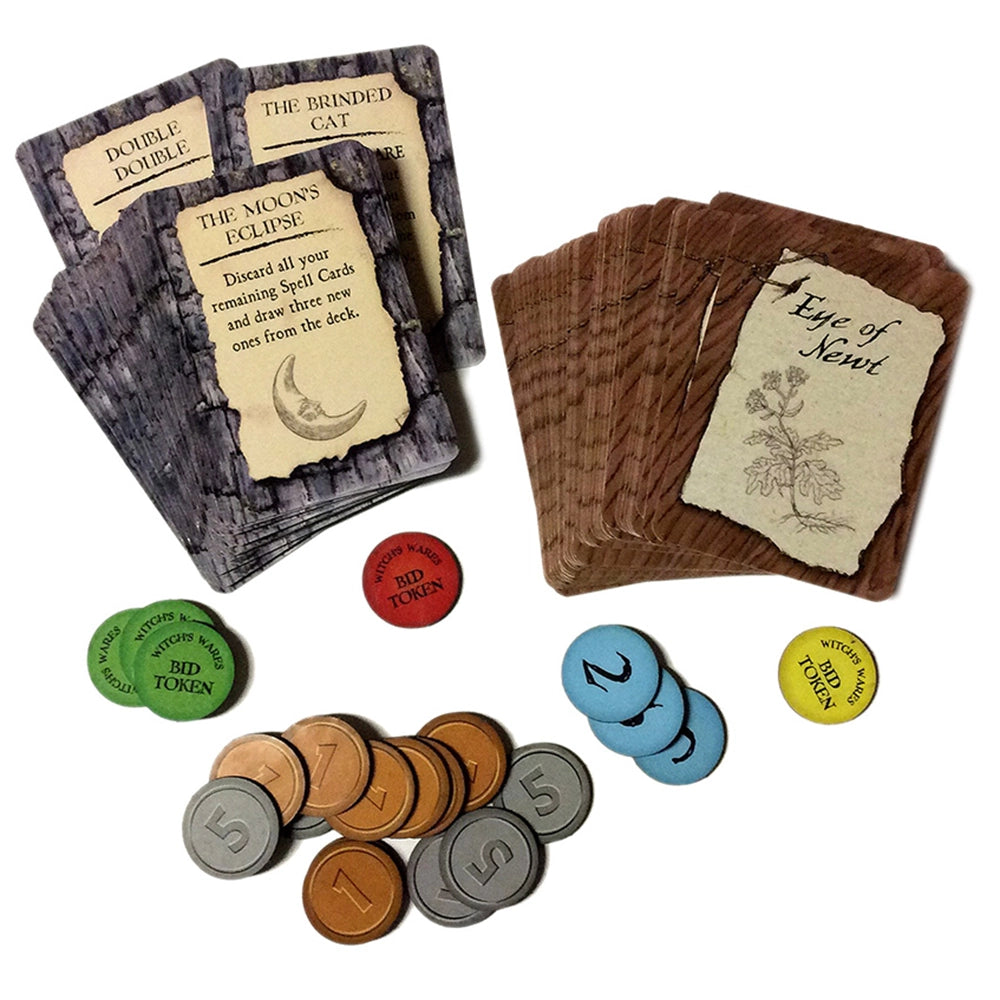 A set of fantasy-themed game cards and tokens arranged on a white background. The set includes a dark gray wood-textured card deck, a brown wood-textured card deck, several illustrated cards, and multiple colored round tokens including silver, bronze, green, red, blue, and yellow.